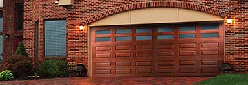 Garage door with upper windows for added security