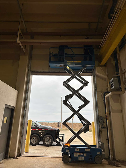 Scissor lift door installation