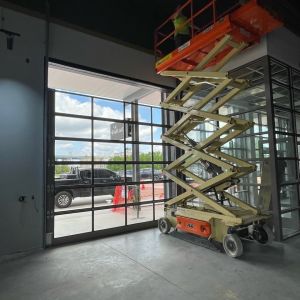 Overhead Door of Metro Milwaukee installing sectional full vision garage doors