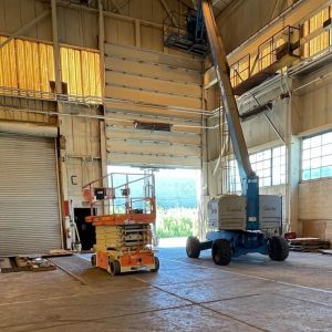 50’ full vertical springless, counterweight garage door at steel factory
